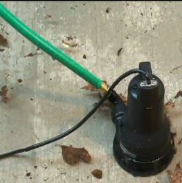 Submersible pump for draining hot tubs